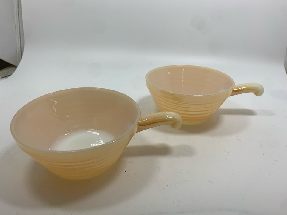 2 PEACH LUSTRE HANDLED SOUP BOWLS.