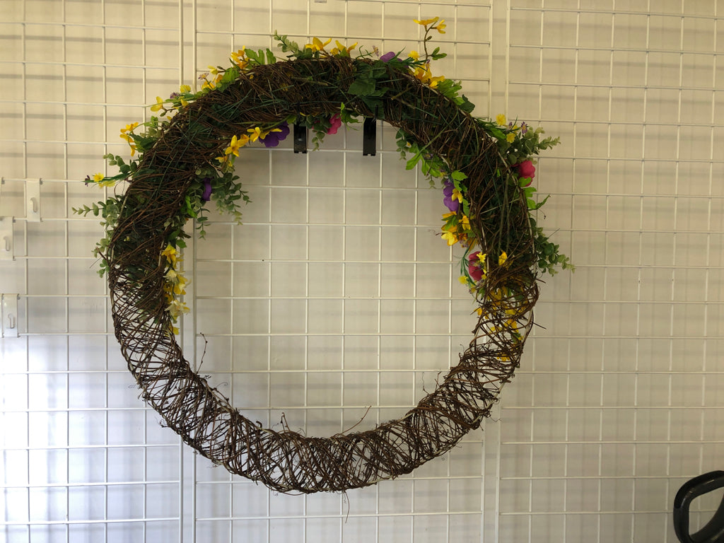LARGE PINK YELLOW PURPLE FAUX FLORAL WREATH.
