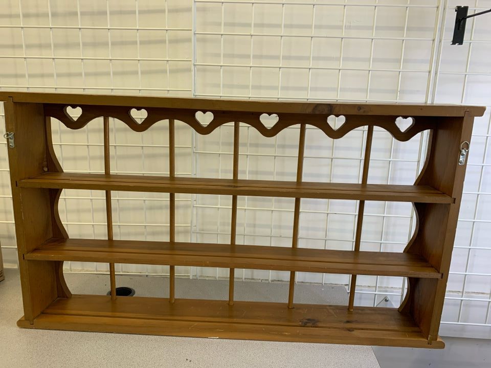 3 TIER WOOD SHELF W/ HEART CUTOUTS.