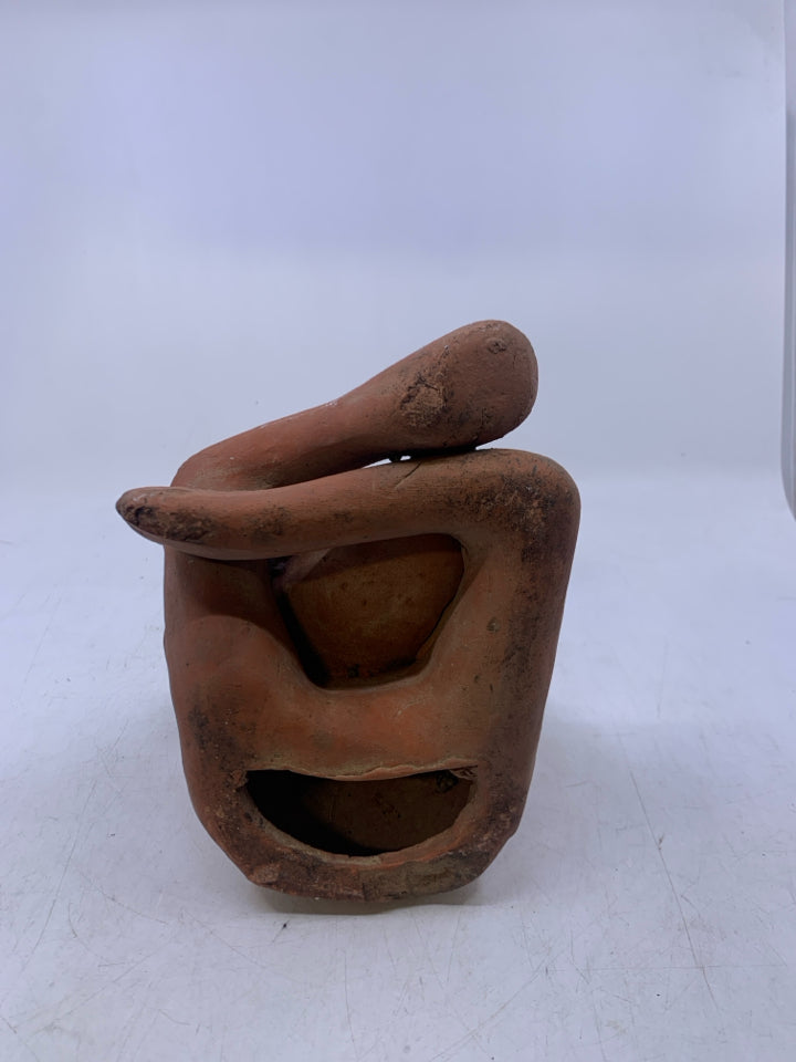 LG CLAY FALK ART MAN SITTING FIGURE.