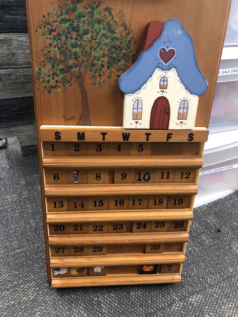 WOOD PRIMITIVE PERPETUAL CALENDAR.
