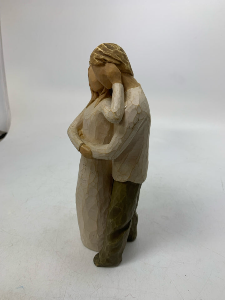 MAN/WIFE HOLDING EACHOTHER "TOGETHER".