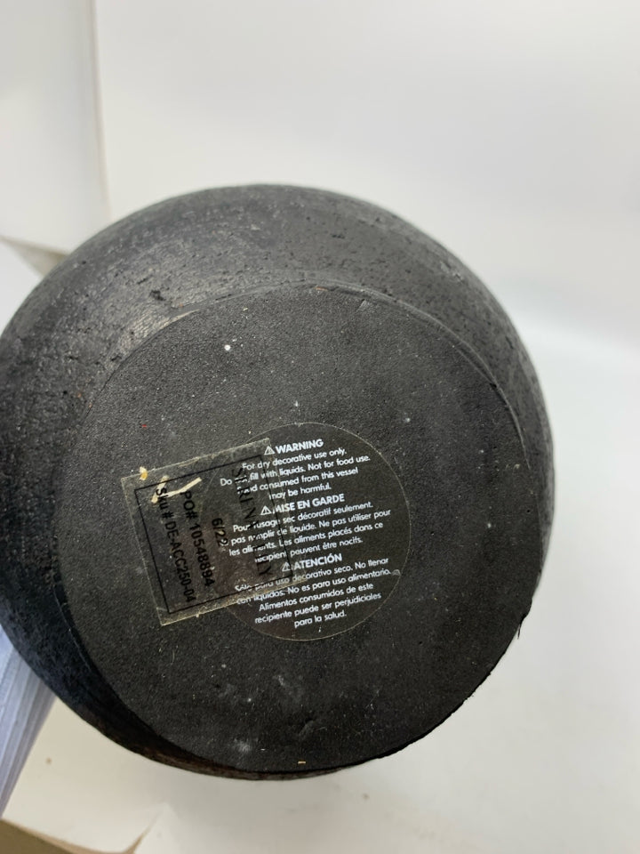 HEAVY MATTE BLACK CIRCLE TEXTURED VASE W/ SMALL HANDLE.