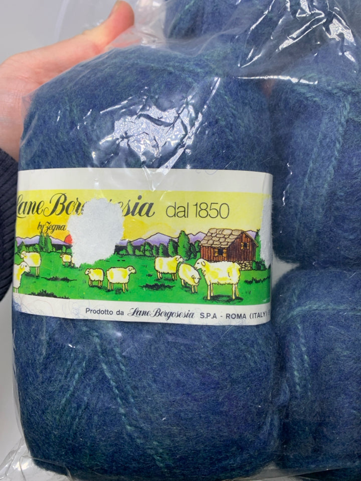 4 DARK BLUE 50% WOOL YARN IN BAG.