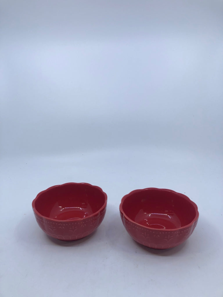 2 SMALL EMBOSSED BOWLS.