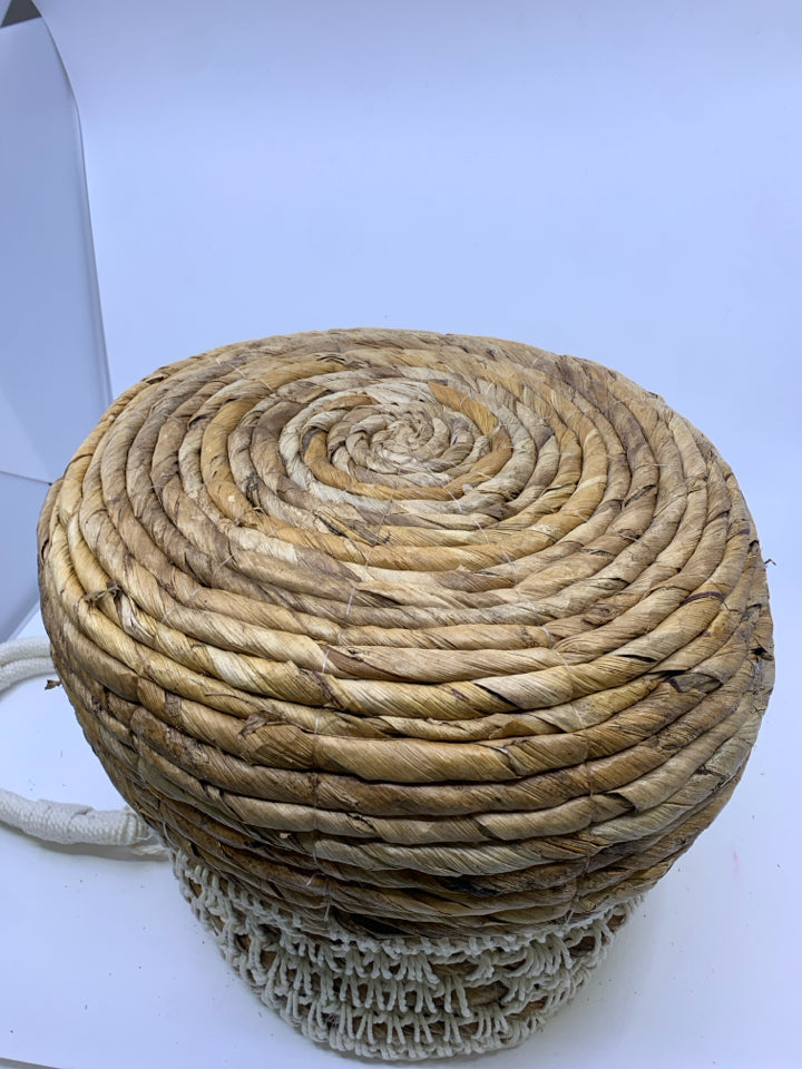 BROWN AND WHITE TOP BASKET WITH WHITE WOVEN HANDLES.