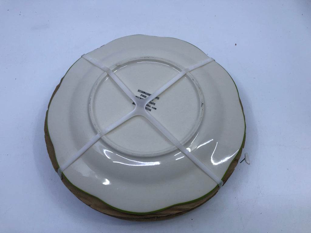 4 GREEN RIMMED FLORAL PLATES.