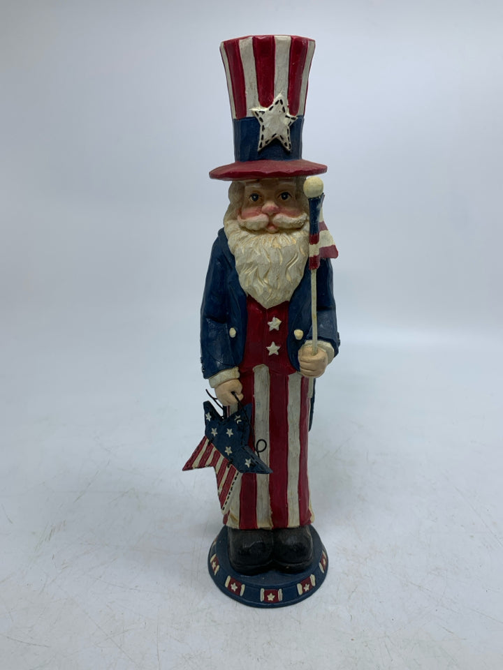 RESIN PATRIOTIC THEMED MAN HOLDING STAR/FLAG.