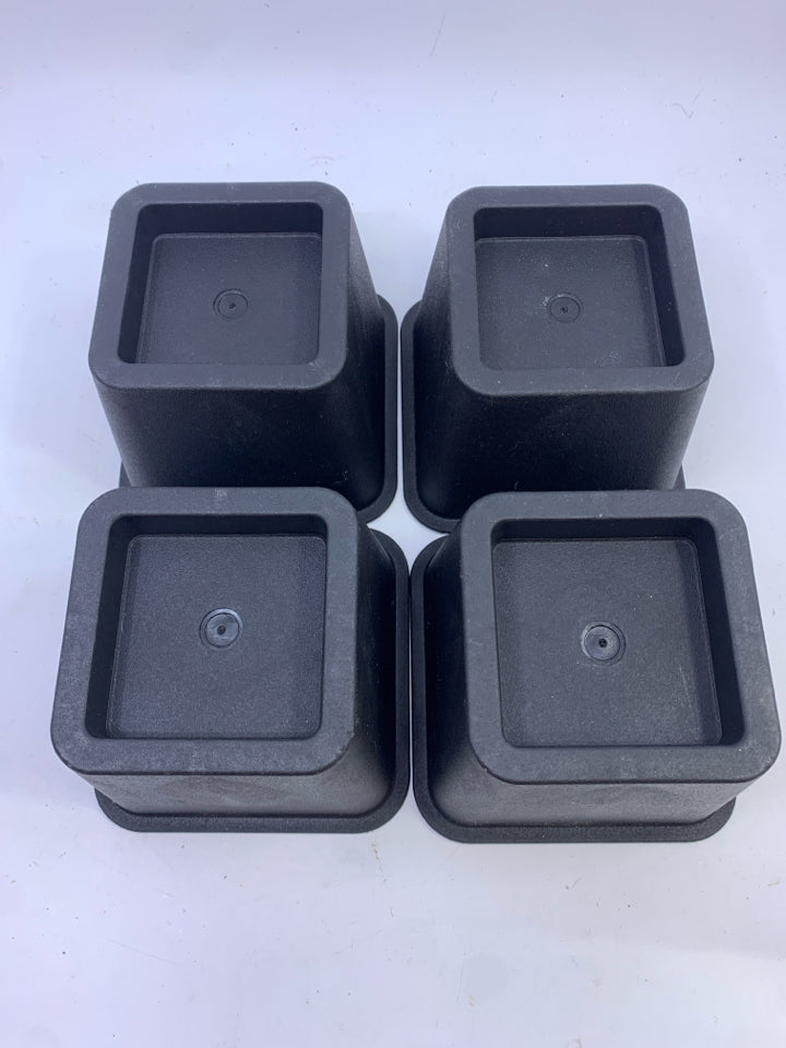 4 SHORT BED RISERS.