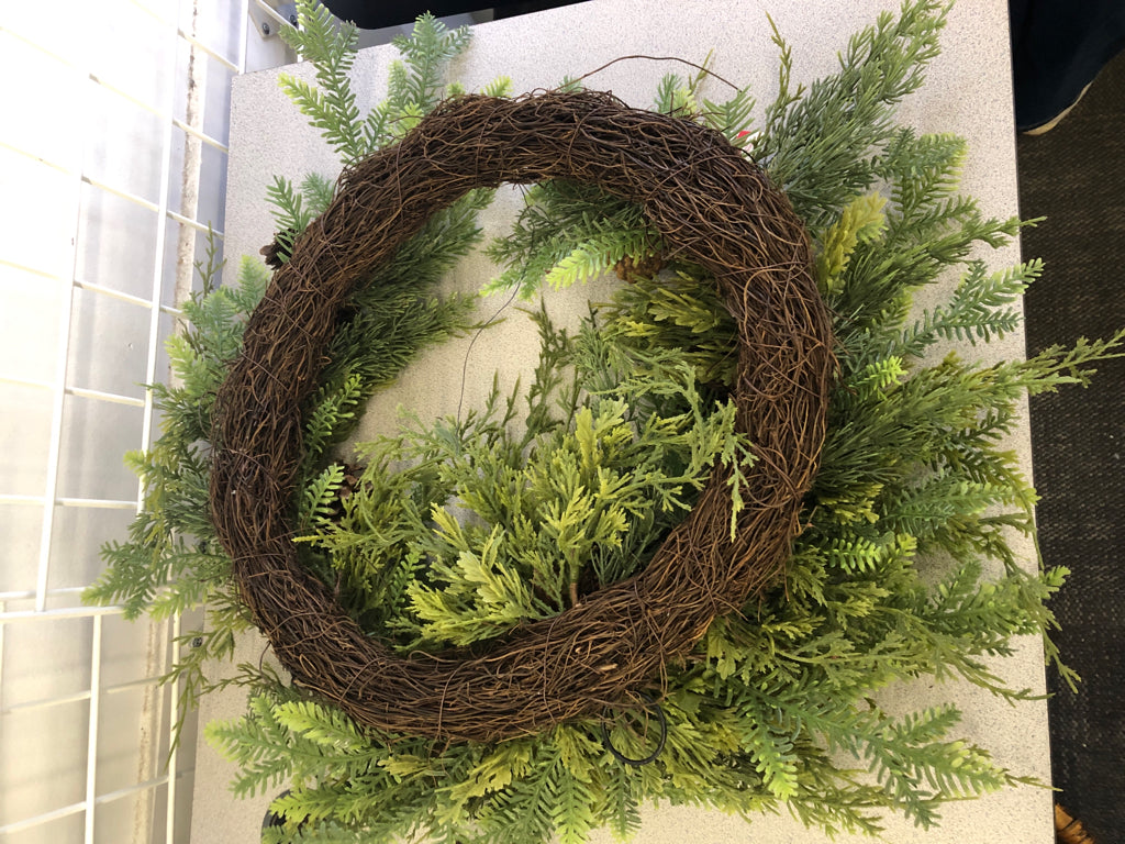 PINECONE AND FERN LEAVES WREATH.