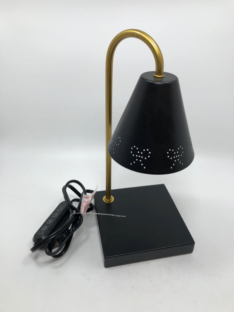 BLACK & GOLD BOW-PUNCHED CANDLE LAMP.