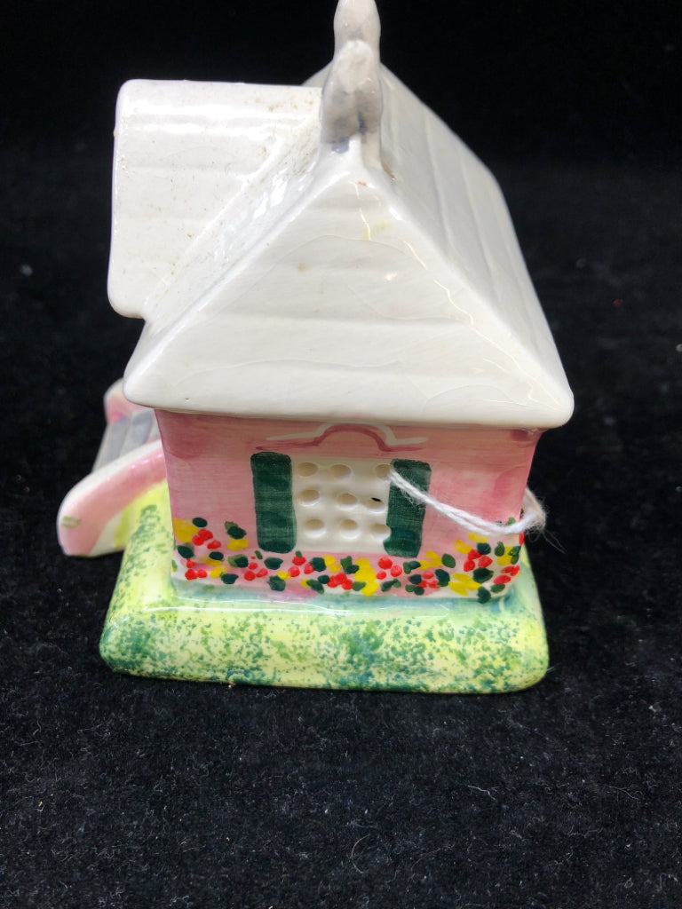 CERAMIC HOUSE TEALIGHT HOLDER.