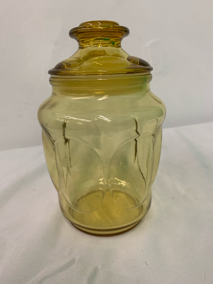 PALE AMBER GLASS CANISTER.
