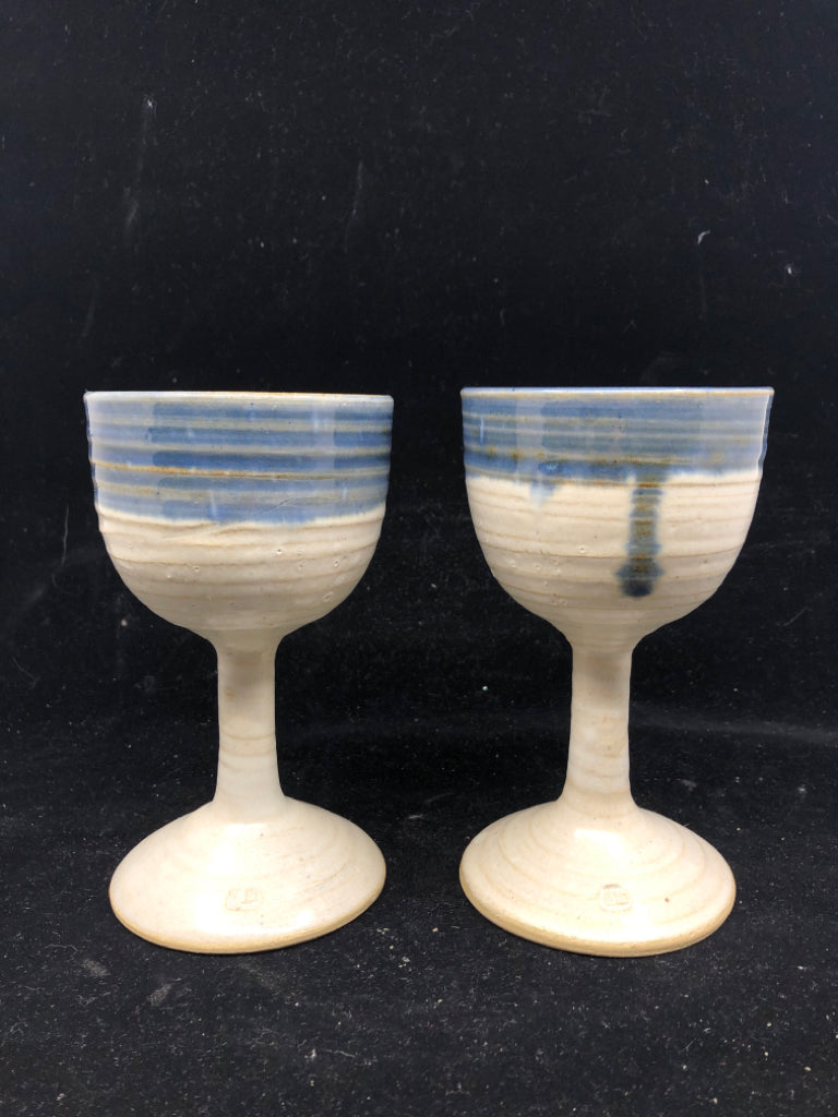 2 POTTERY WINE GLASSES WHITE/BLUE.