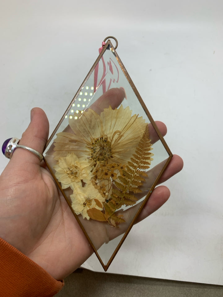 DIAMOND PATTERN GLASS W/ DRIED FLOWERS.