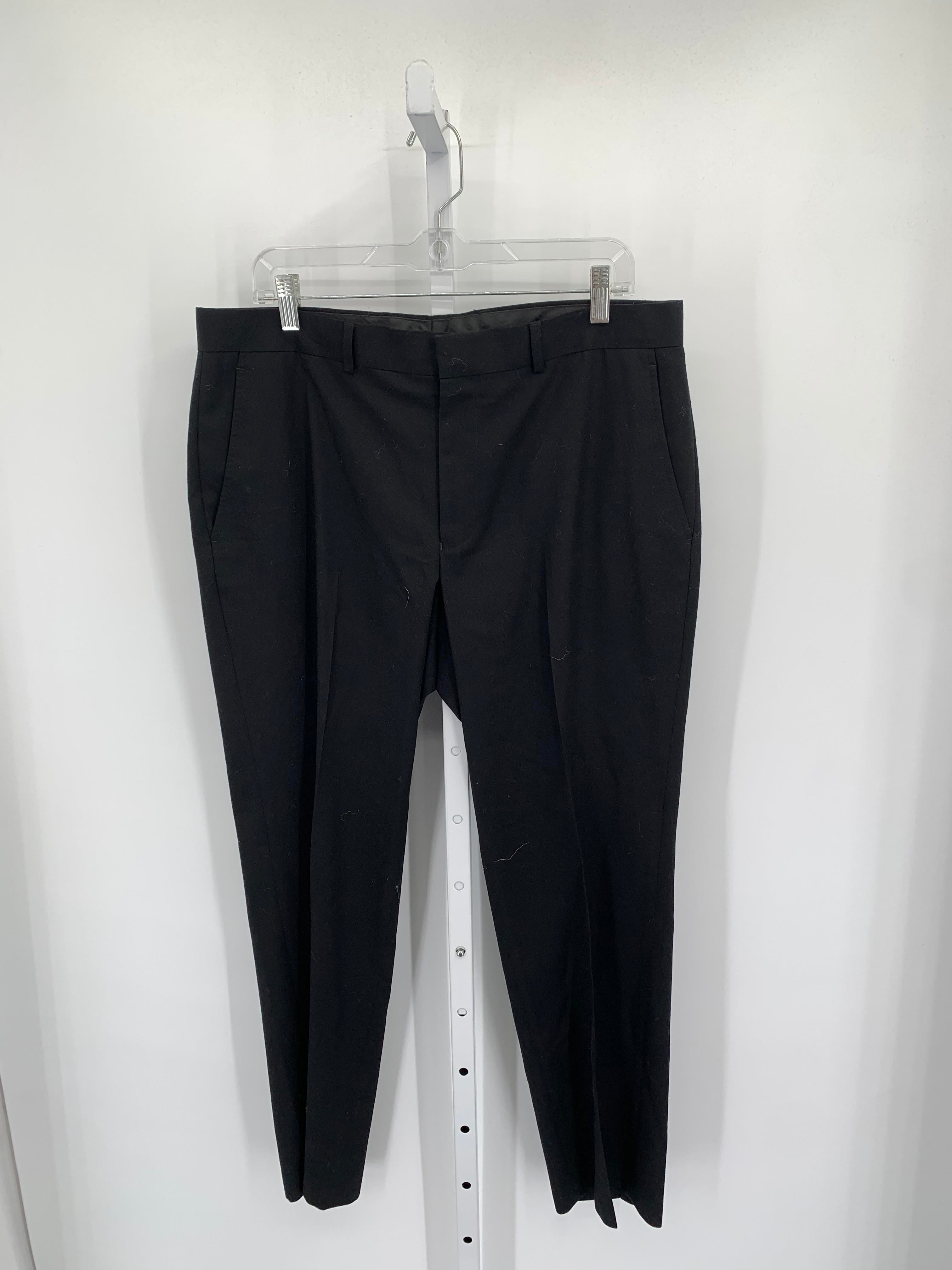 FLAT FRONT PANTS.