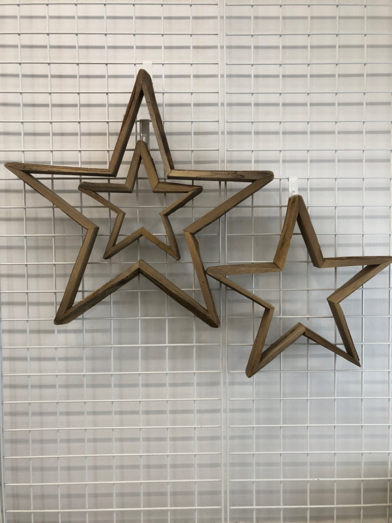 3 WOODEN NESTING STARS WALL-HANGING.