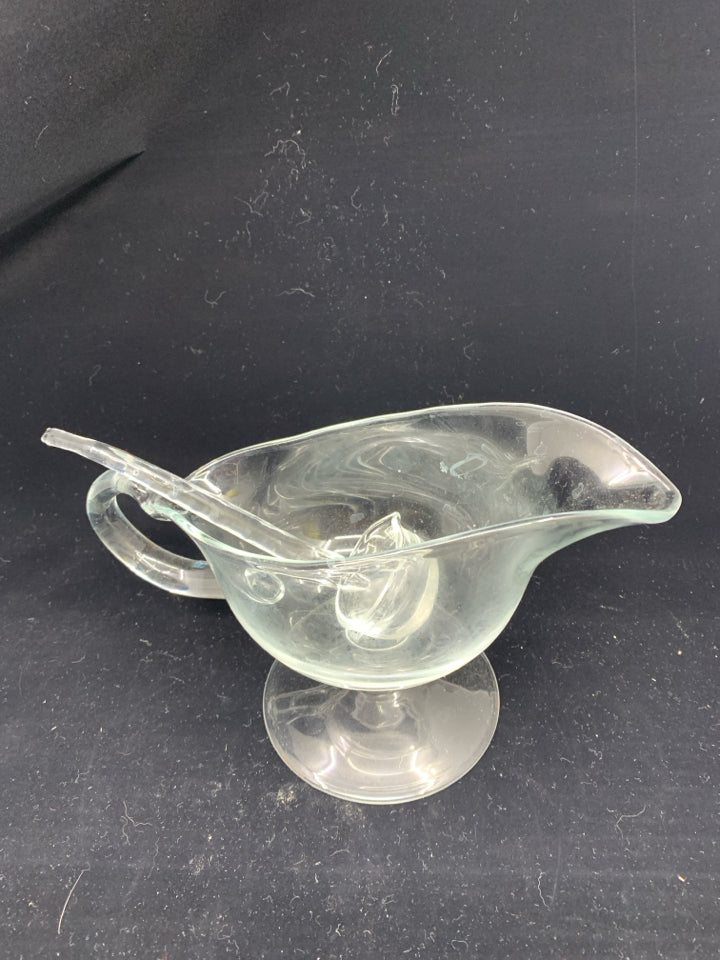 FOOTED GLASS GRAVY BOAT W SPOON.