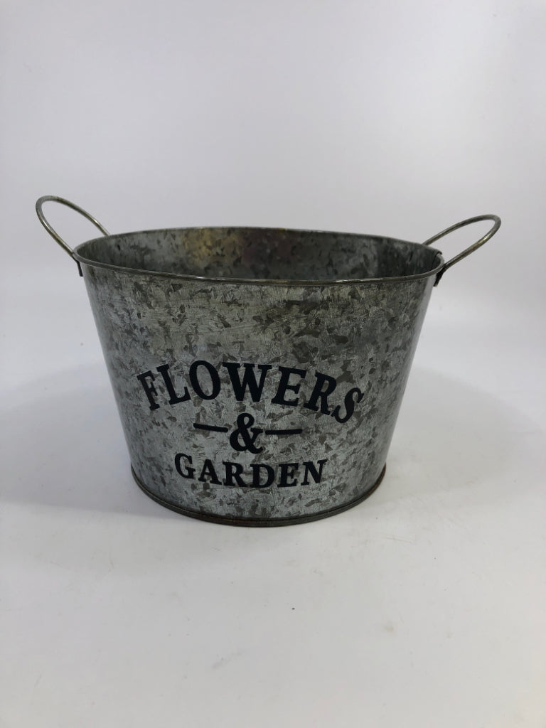 GALVANIZED METAL FLOWERS AND GARDEN BUCKET.
