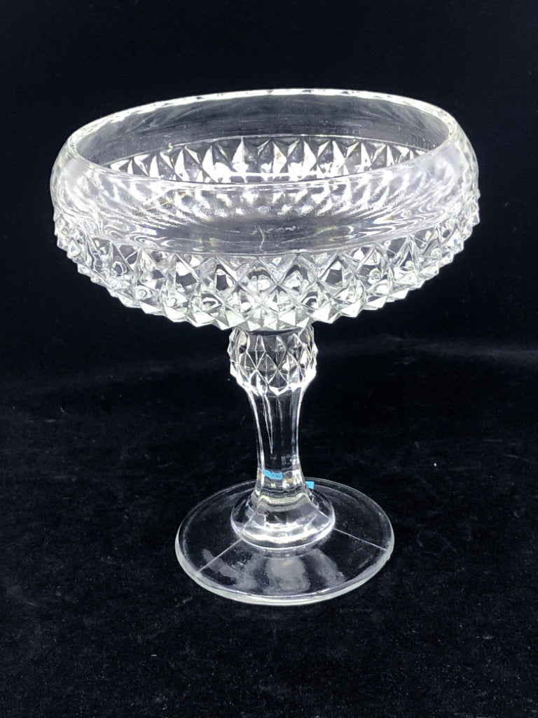TALL CLEAR CUT GLASS CANDY DISH ON PEDESTAL.