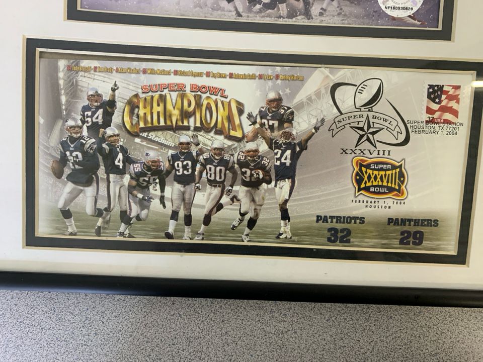 PATRIOT STORM SUPERBOWL CHAMPS FRAMED ART.