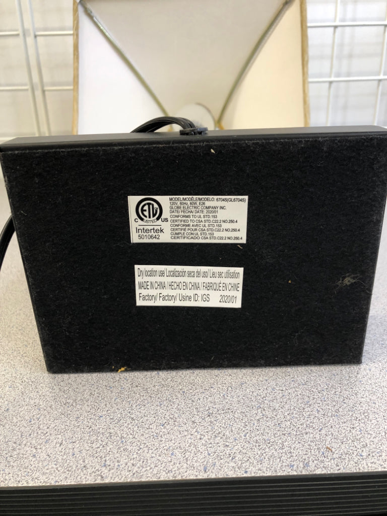 METAL BASE LAMP W/FAUX LEATHER TAN SHADE.