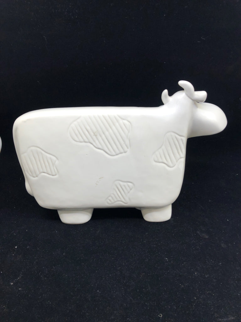 WHITE CERAMIC FLAT COW.