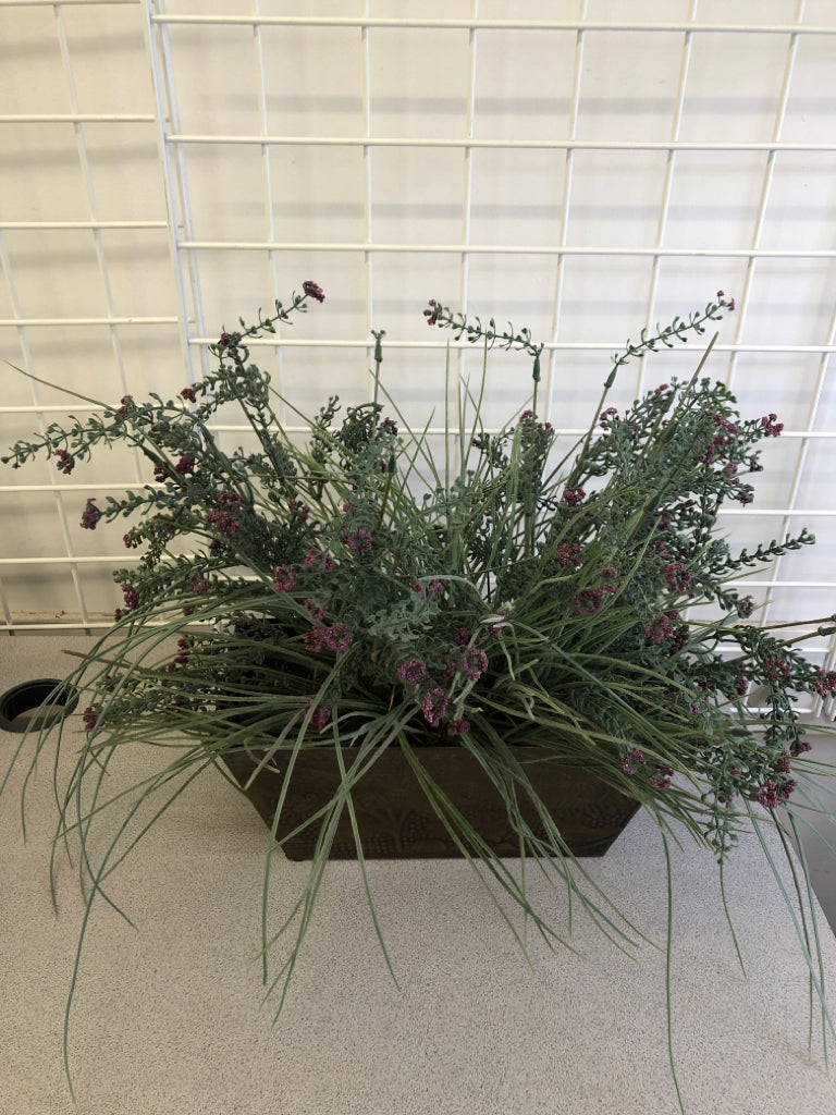 FAUX LAVENDER IN METAL PLANTER.