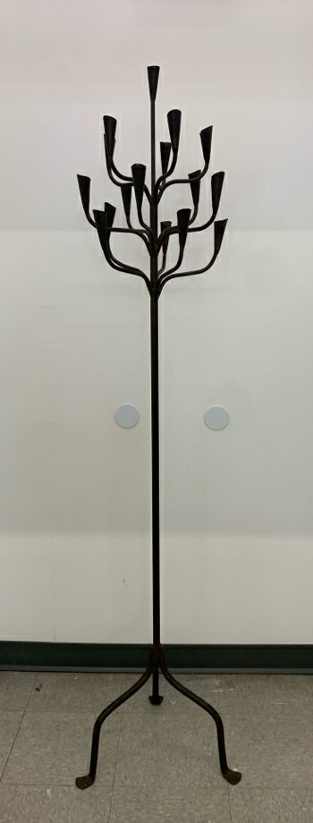 HEAVY WROUGHT IRON STANDING 16 SLOT TAPERED CANDLE HOLDER.