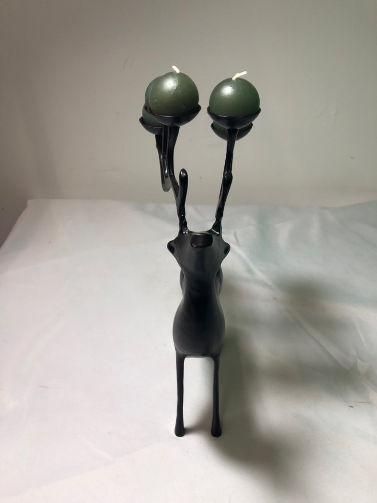 BLACK METAL DEER W/ 6 GREEN CIRCLE CANDLES ON ANTLERS.