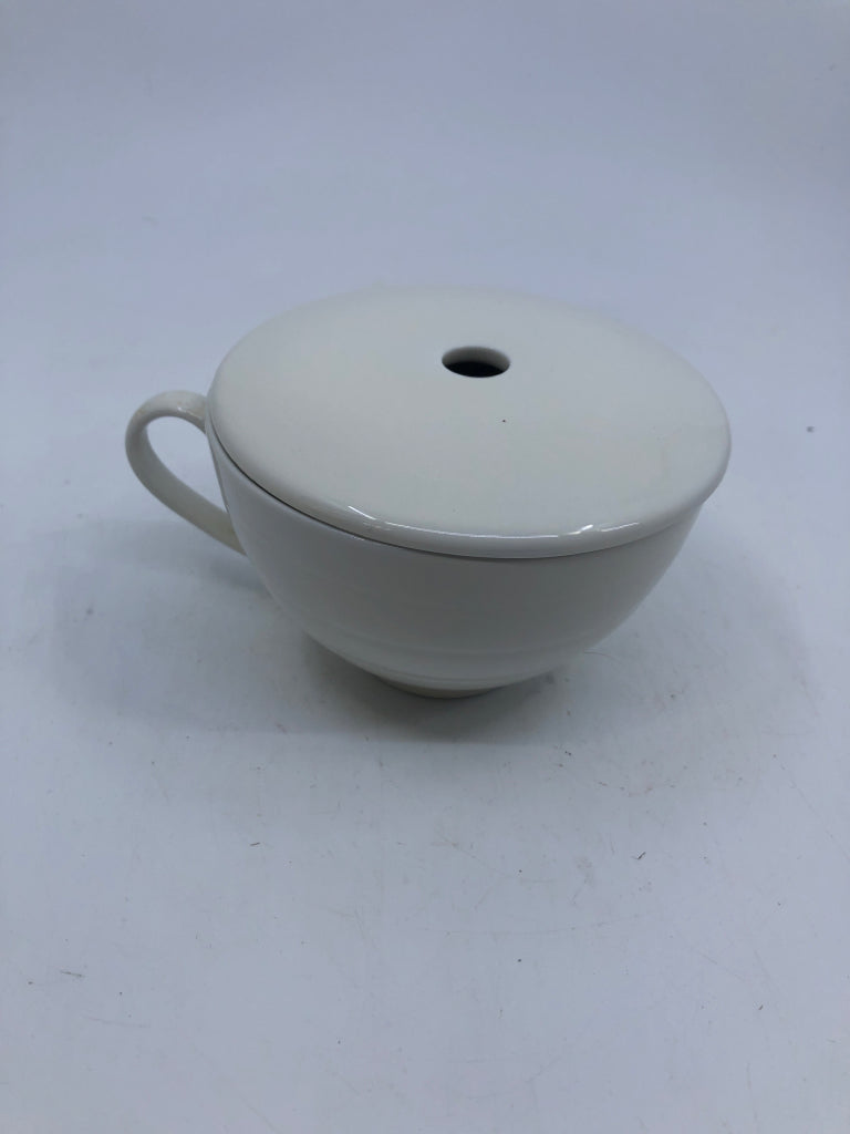WHITE MUG W/ LID HOLE IN CENTER.