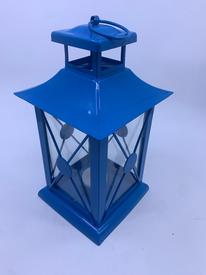 BLUE METAL TEA LIGHT LANTERN.