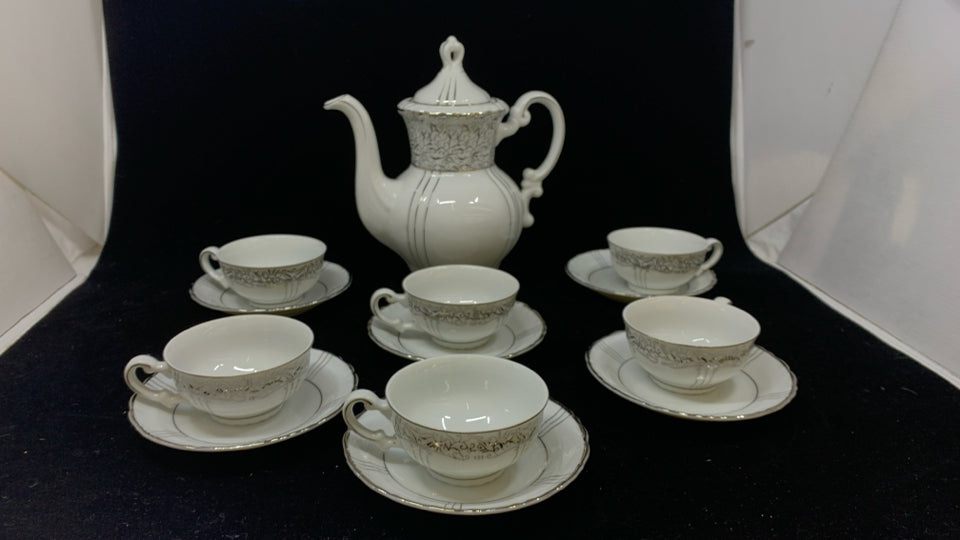 13PC FINE CHINA TEASET WHITE W/SILVER RIM.