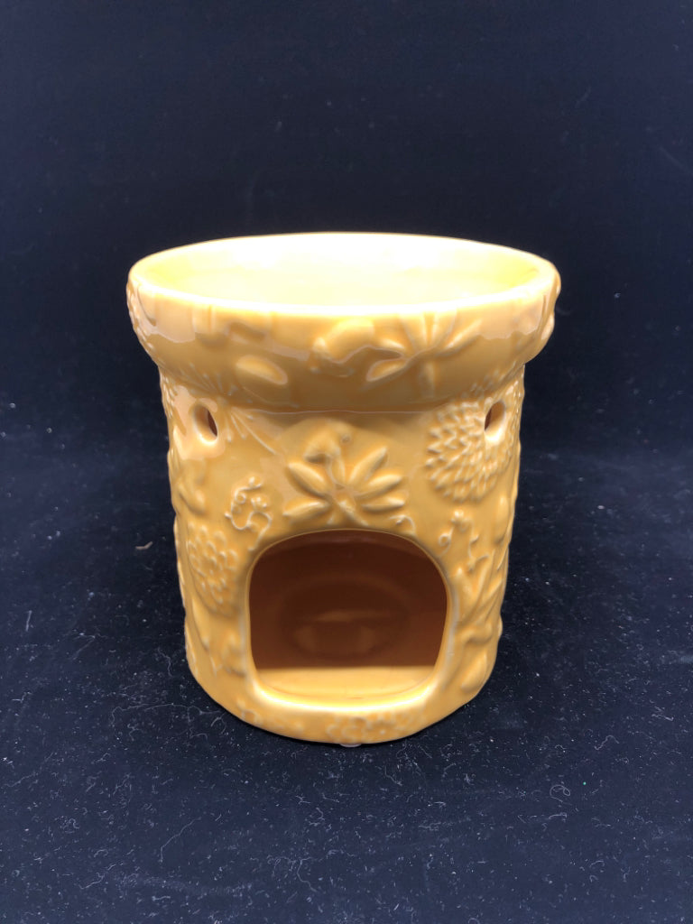 YELLOW W EMBOSSED LEAVES TEA LIGHT WAX MELT.