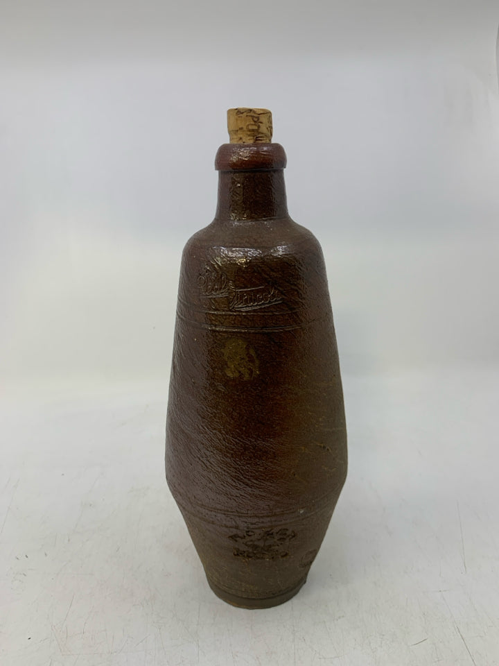 VTG EMPTY DARK BROWN POTTERY BOTTLE.