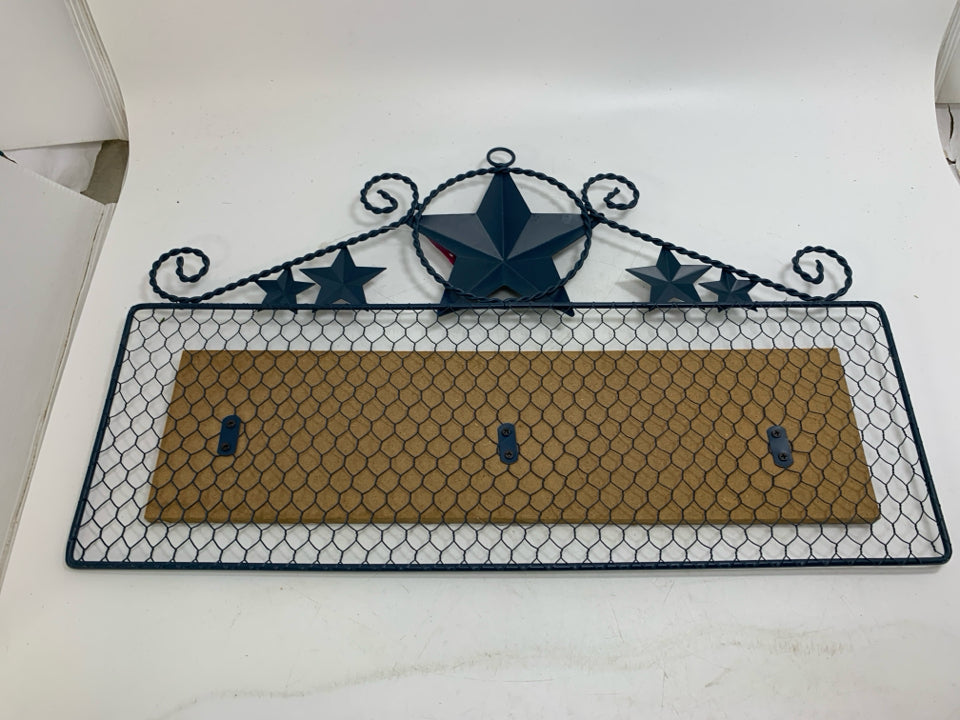 BLUE CHICKEN WIRE W/ STARS WELCOME SIGN.