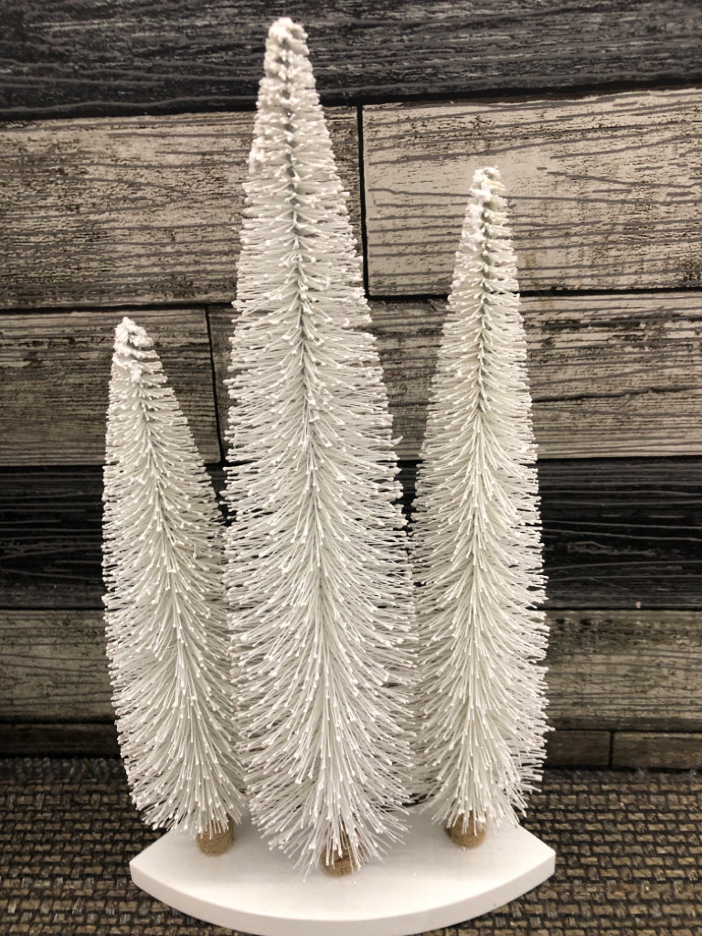 3 WHITE CHRISTMAS TREES WITH WHITE GLITTER BASE.