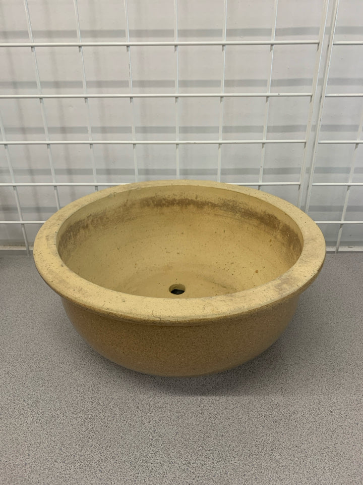 LARGE HEAVY PLANTER W/ DRAINS.