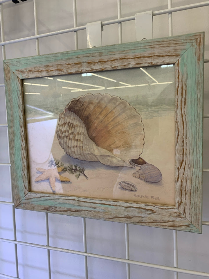 SEA SHELL PRINT IN DISTRESSED TEAL FRAME.