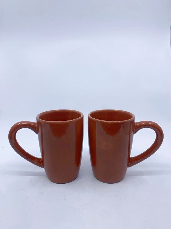 2 TAN MUGS.