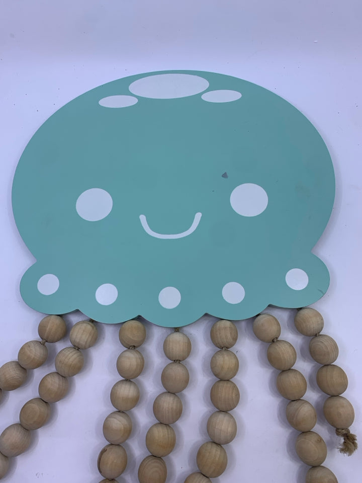 TEAL JELLY FISH W BEADS.