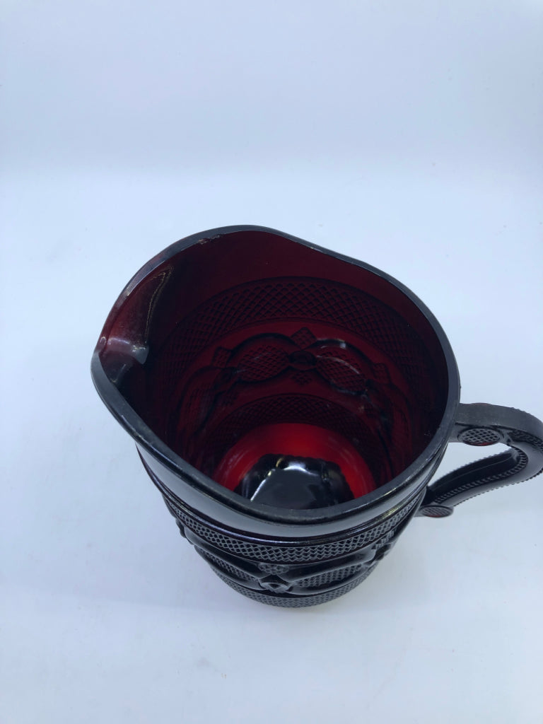 VTG FOOTED CRANBERRY GLASS CUT PITCHER.