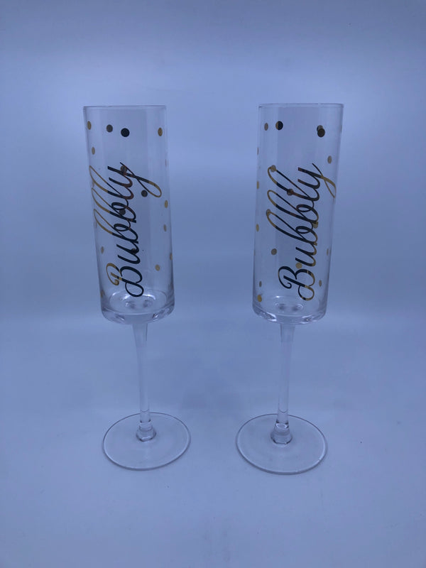 2 CHAMPAGNE FLUTES W/ BUBBLY IN GOLD W/ POLKA DOTS.