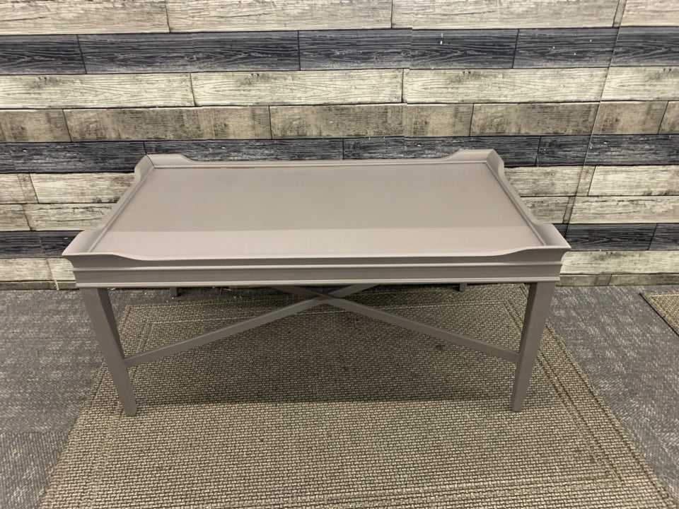 LIGHT BROWN PAINTED WOOD TABLE.