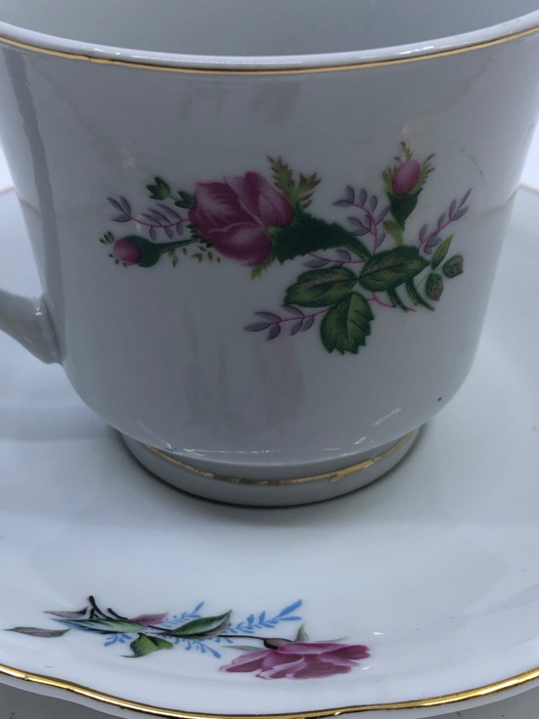 PINK, BLUE ROSE TEACUP AND SAUCER.