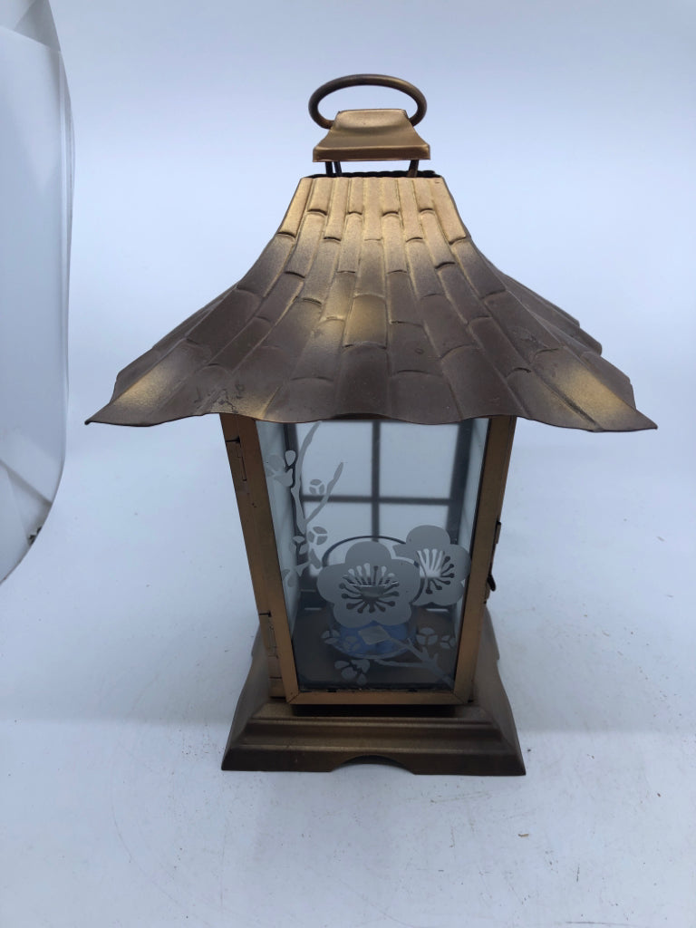 BRONZE METAL LANTERN WITH EMBOSSED FLOWER DESIGN ON GLASS AND FROSTED GLASS PANE