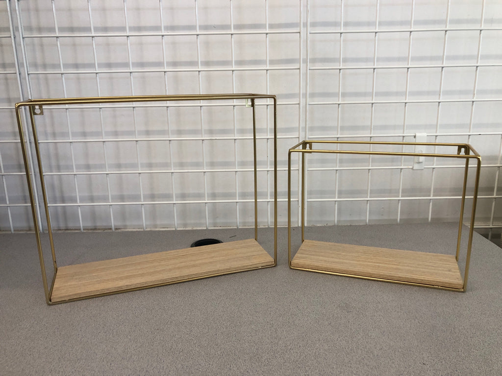 2 GOLD SHELVES W/TAN WOOD BASE.