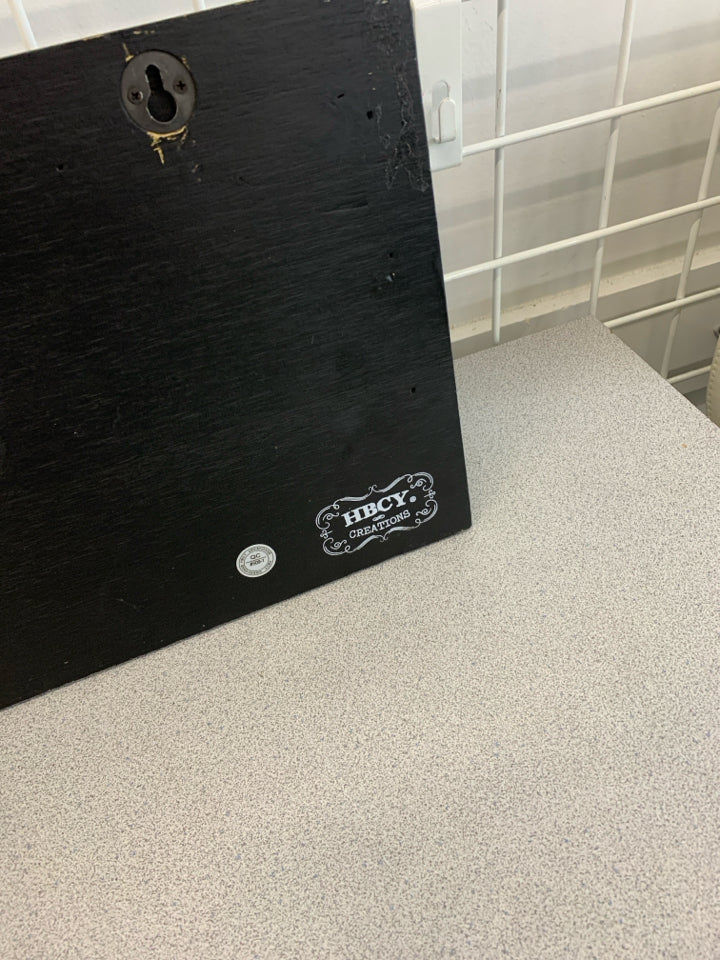 BLACK WALL SHELF W/ 5 HOOKS.