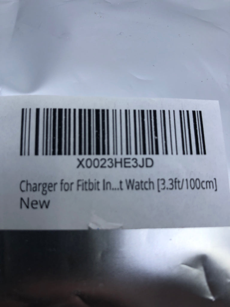 NIP FIT BIT CHARGER.