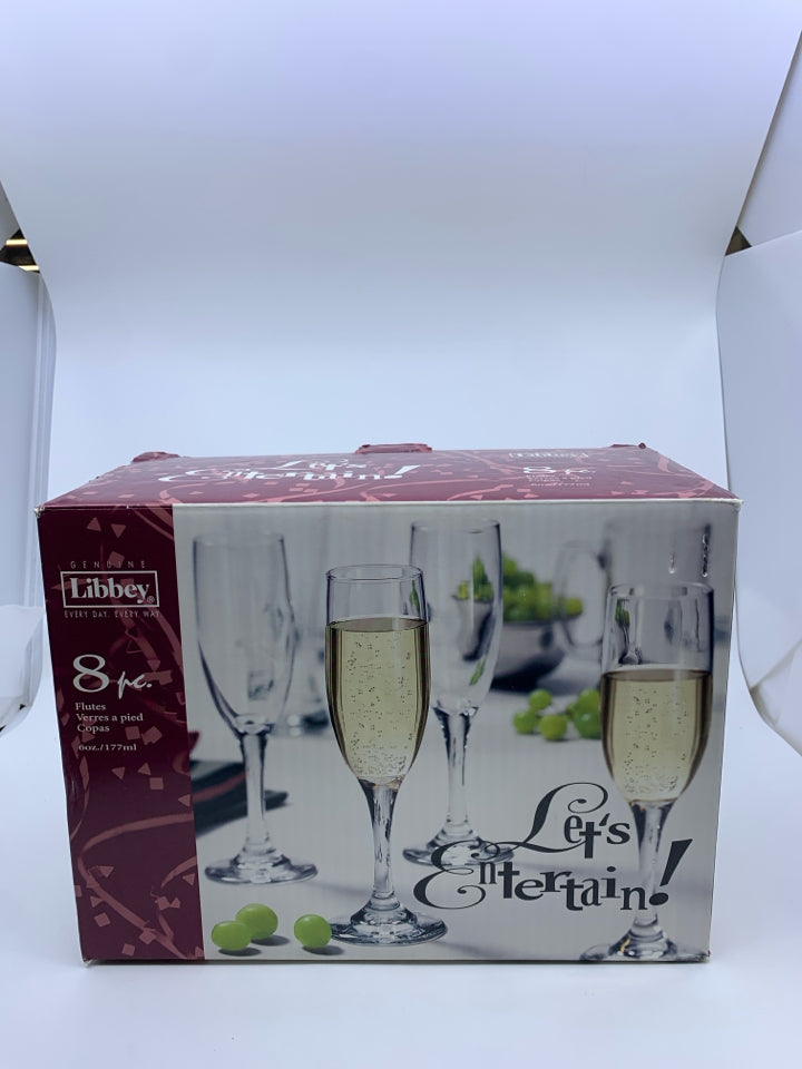 NIB LIBBEY 8 CHAMPAGNE FLUTES.